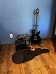 Zestaw gitarowy Washburn + piec Stagg 10GA + pokrowiec i akcesoria