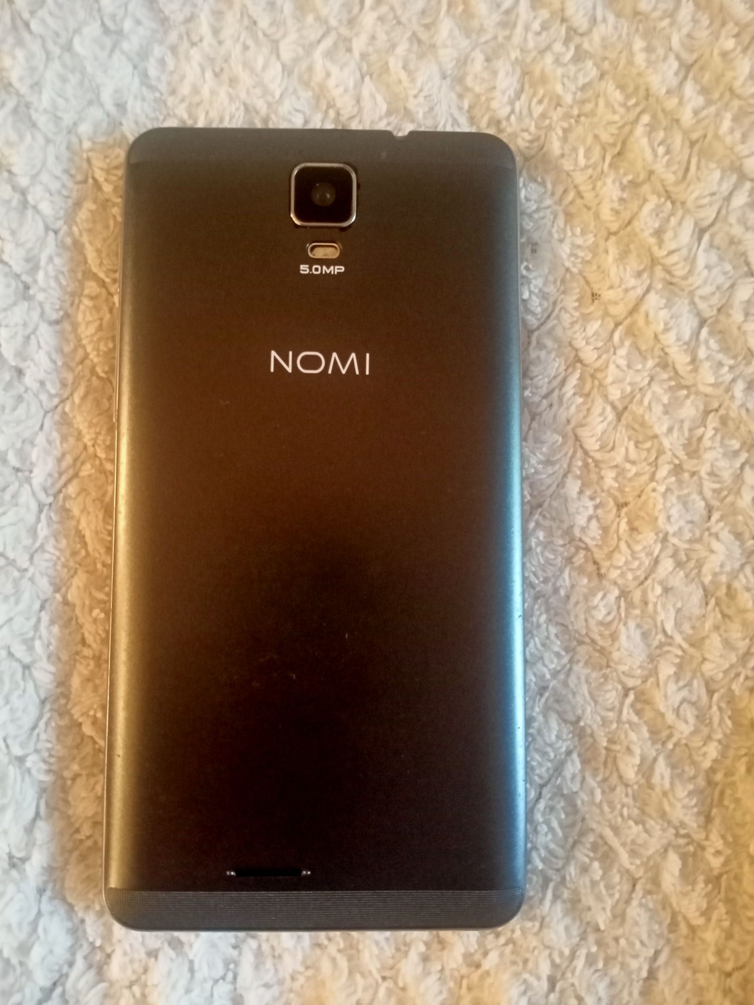 Телефон Nomi i4510