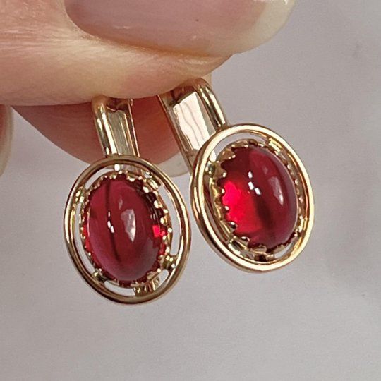 Продам золотые серьги
