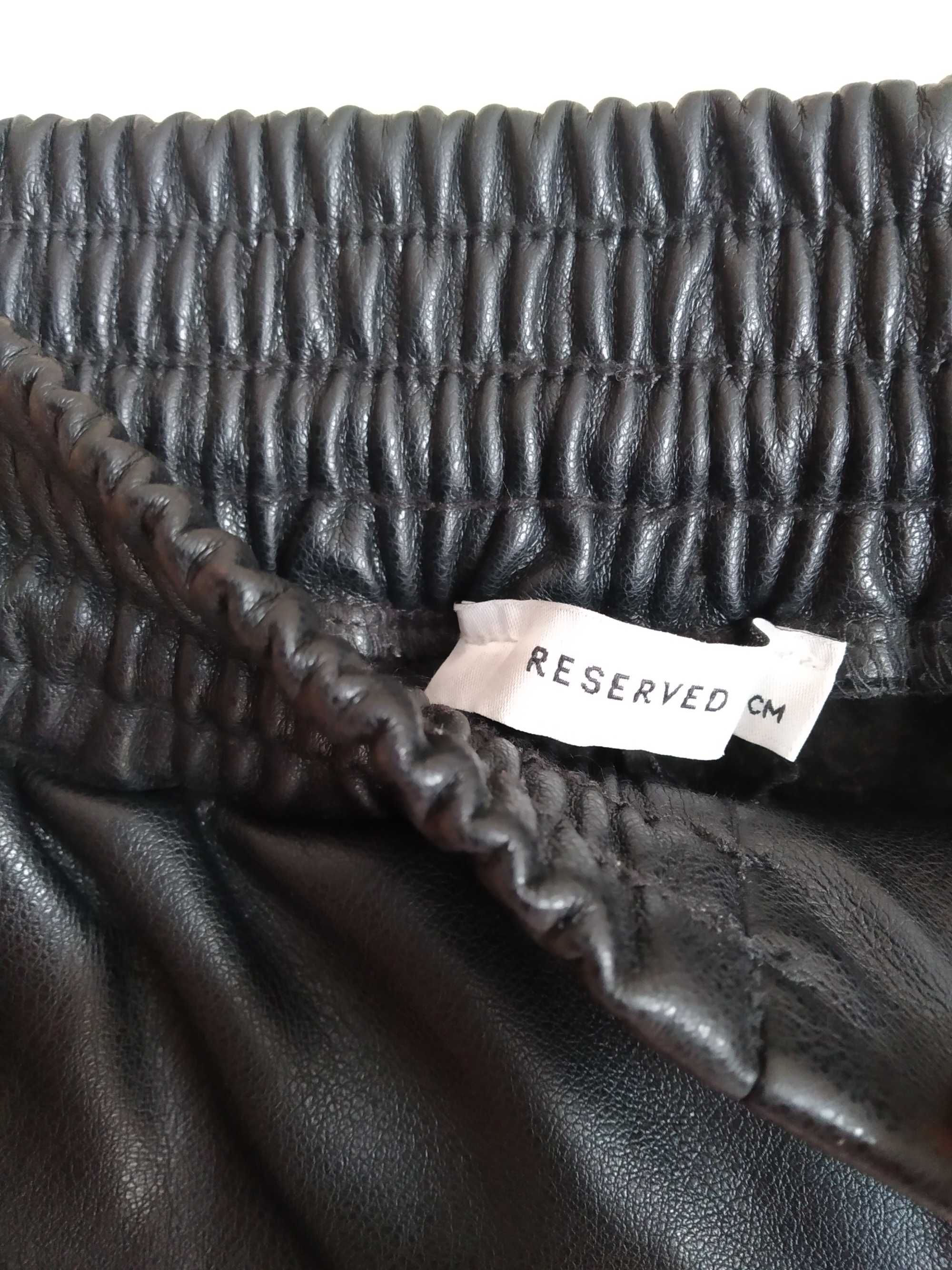 Czarne spodnie z ekoskóry dla dziewczynki Reserved 146 cm