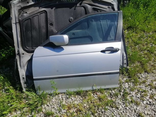 Drzwi  BMW E 46  zamek Winda Lusterko szyba Podnośnik tapicerka