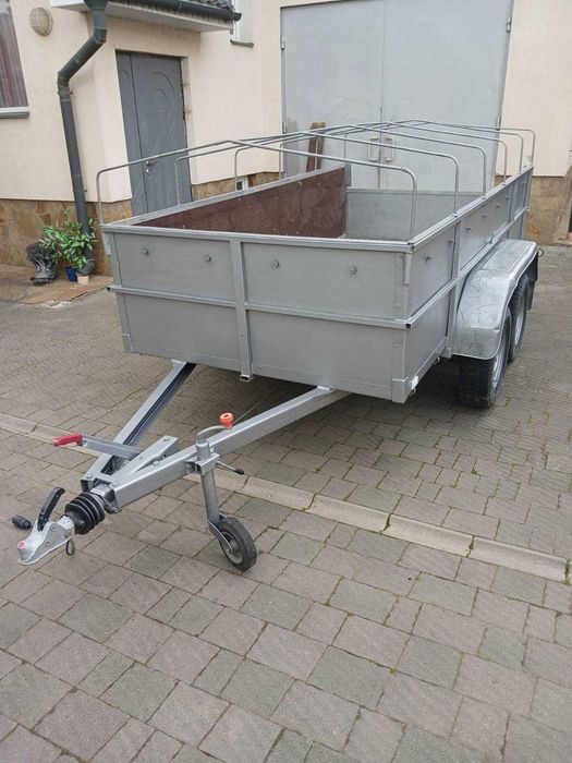 Прицеп легковий двохосний з гальмами