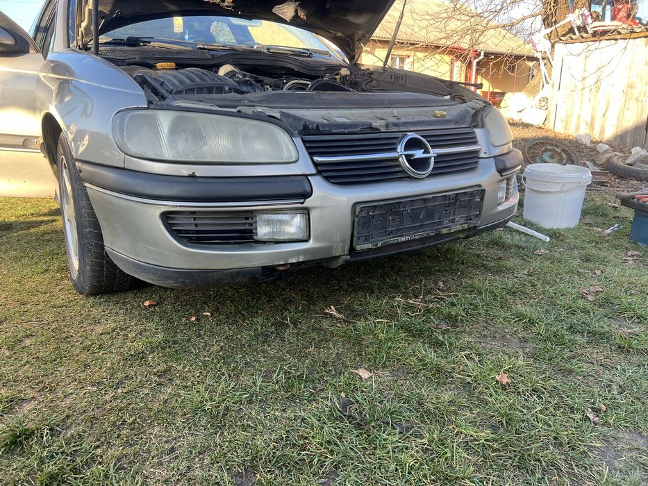 Передній бампер,решітка,мотор,фари,двері,капот опель омега б 1996