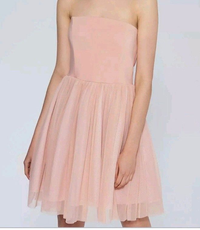 Piekna różowa tiulowa sukienka