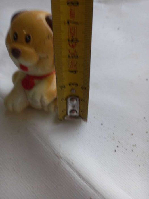 Figura decorativa em forma de cãozinho