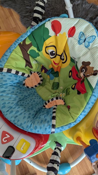 skoczek interaktywny dla dzieci baby einstein neighborhood friends