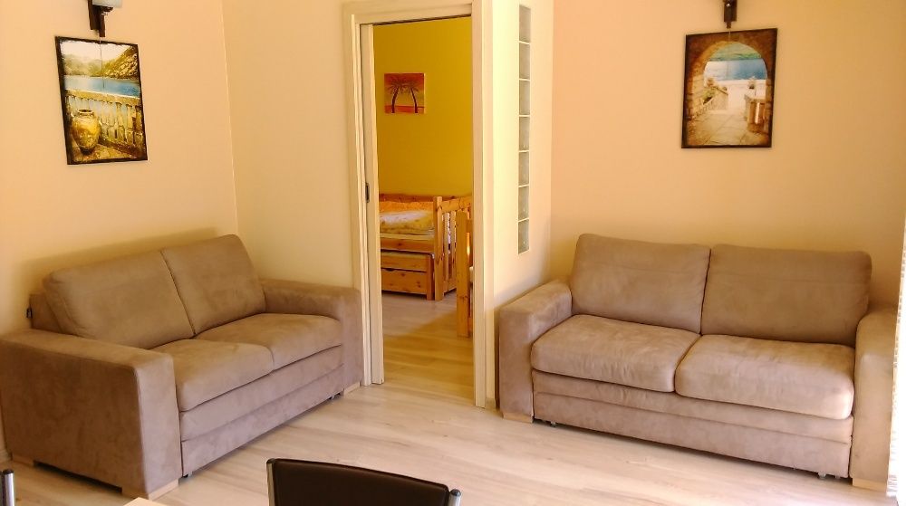 APARTAMENT NAD MORZEM 2-po. z ogrodem i parkingiem.