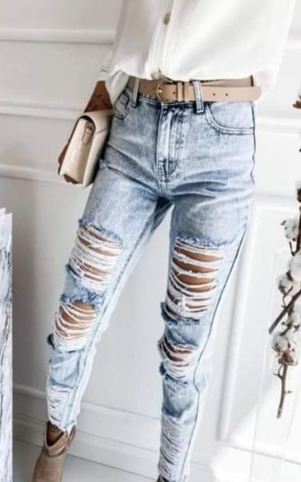 Nowe jeansy spodnie z dziurami poszarpane hit sezonu rozmiar M