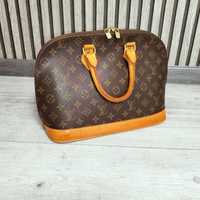 Шкіряна сумка Louis Vuitton.