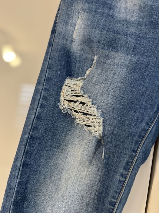 Jeansy damskie z rozdarciami rozmiar L