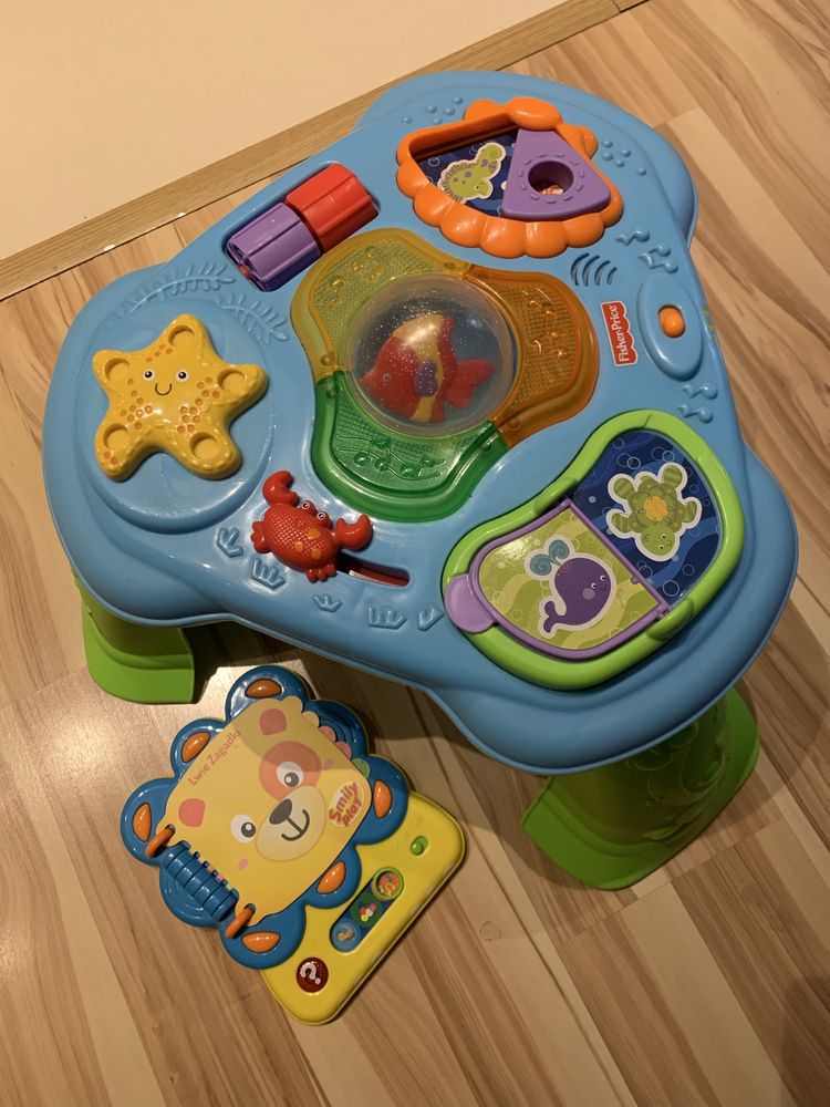 Stolik fisher price i grające lwie zagadki