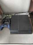 PlayStation 4 (500 GB) + 3 pady + 7 gier – stan bardzo dobry