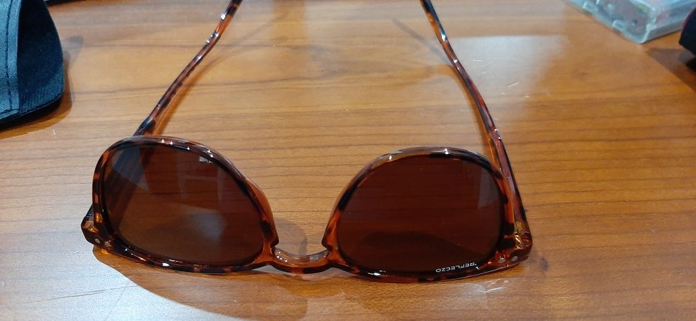 Oculos de sol reflexso novos
