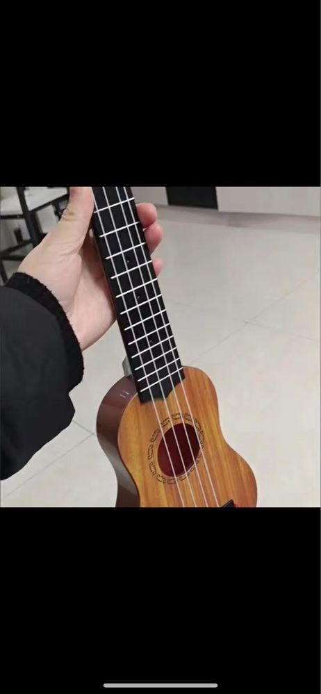 Іграшка гітара невеликого розміру