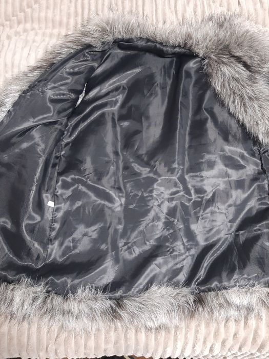 Меховая жилетка женская