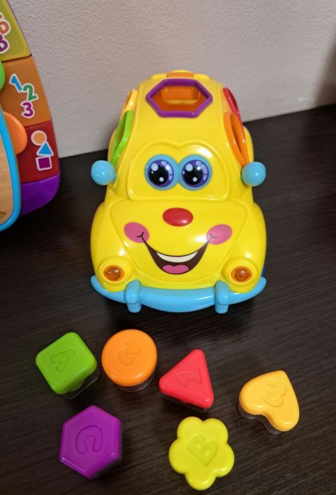 Книжечка з віршиками, руль та машинки