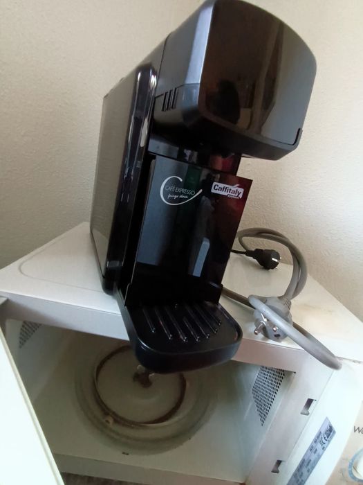 Para peças(?)máquina café + microondas