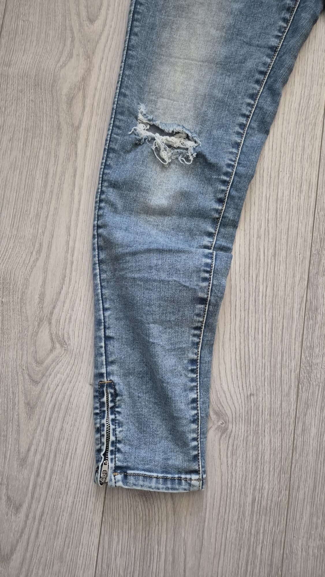 jeansy skinny z dziurami rozm. M