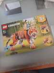 lego creator 3 em 1 de tigre, peixe e panda