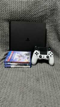 PlayStation 4Slim 1TB + 2 pady i 3 gry