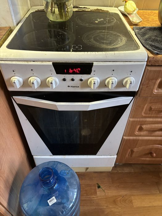 Електро плита з духовкою