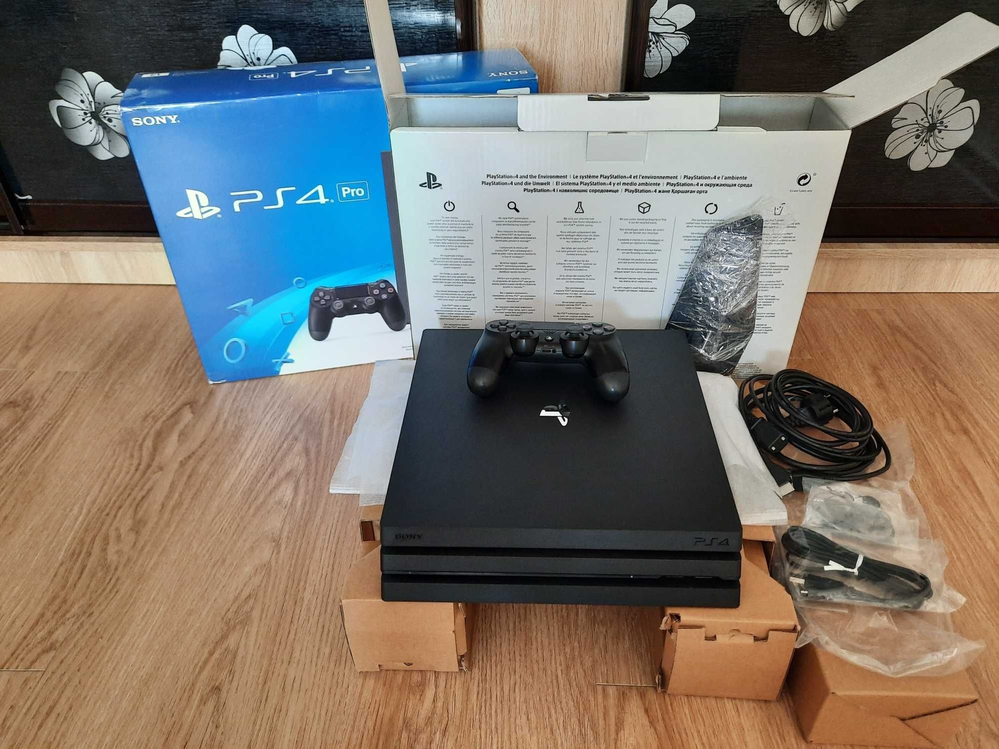 Ігрова приставка Playstation 4 Pro з набором ігор.