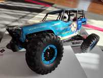 Model rc Wltoys 10428 rock crawler