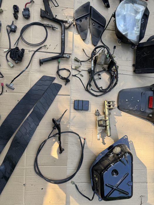 Honda Pantheon 150 owiewka lampa czujnik kiwak instalacja uchwyt wąż