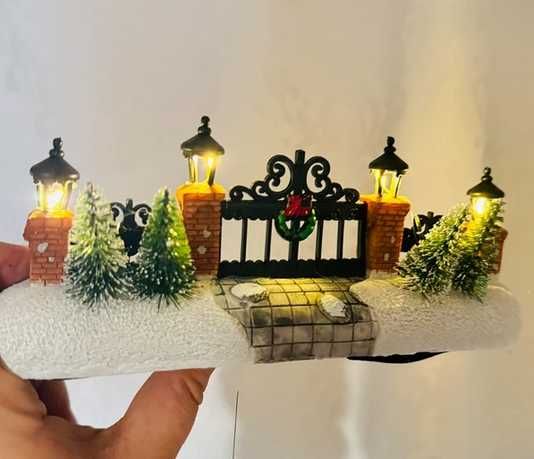 Brama ogrodzenia Magic Village z oświetleniem do wioski magic village