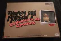 Jogo do homem que mordeu o cão, a caderneta de cromos