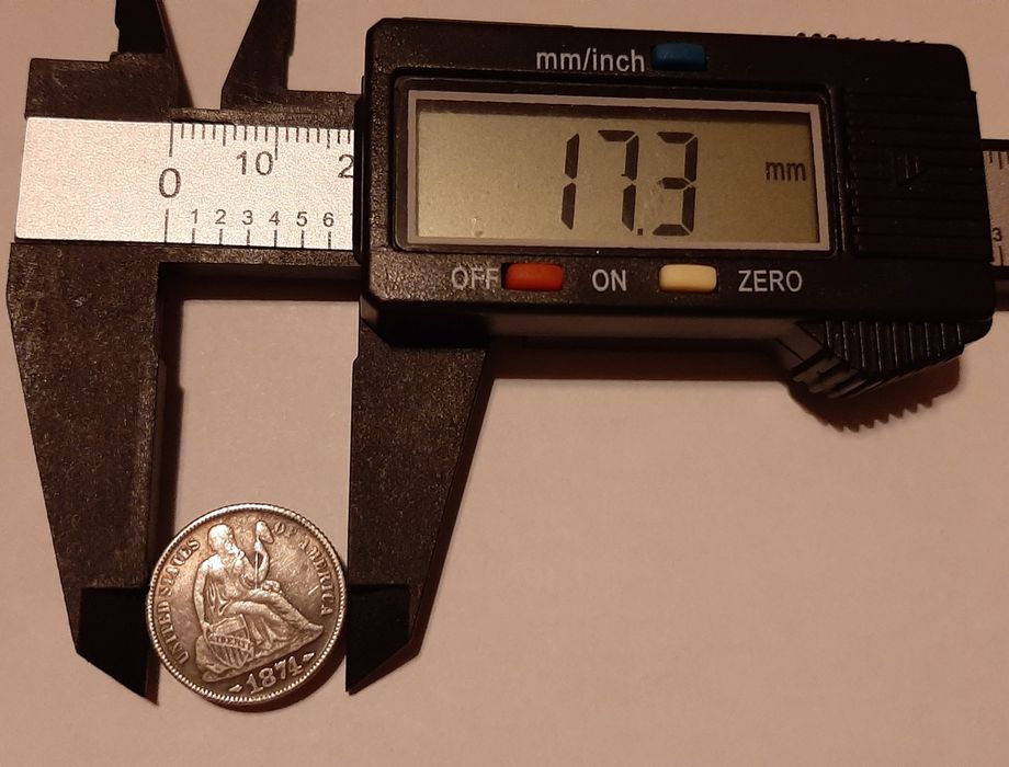 Moneta Dime z siedzącą Wolnością