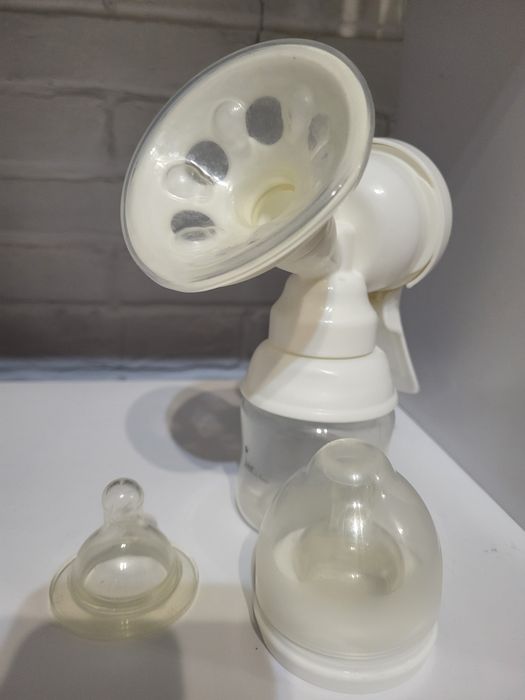 Молоковідсмоктувач+ пакети для грудного  молока