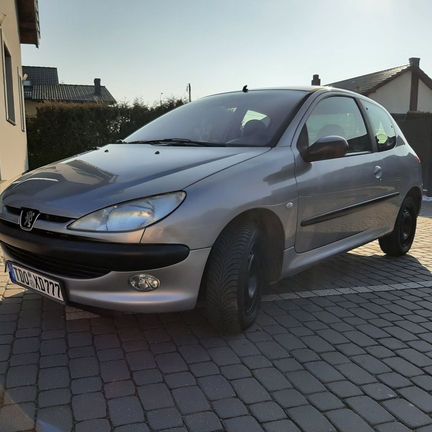 Peugeot 206 lampy przód drzwi alternator itp