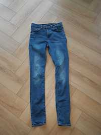 Spodnie Jeansy niebieskie rurki skinny elastyczne 36 długie