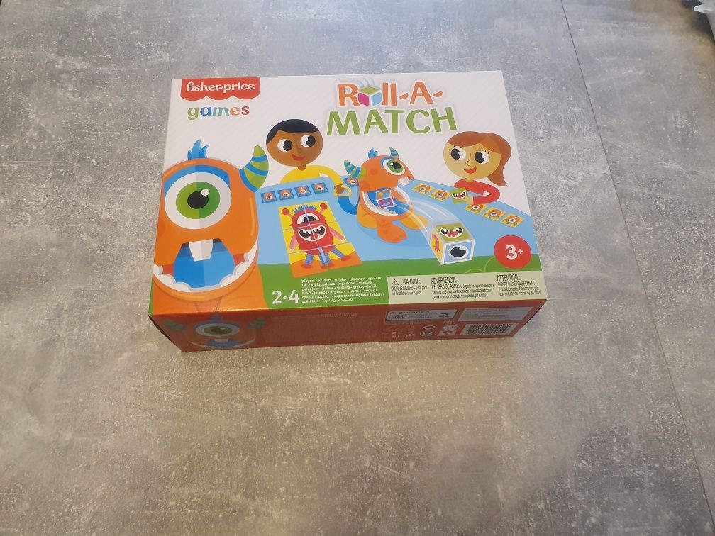 PL Fisher Price Gra towarzyska edukacyjna POTWORKOWE MEMORY Roll-A-Mat