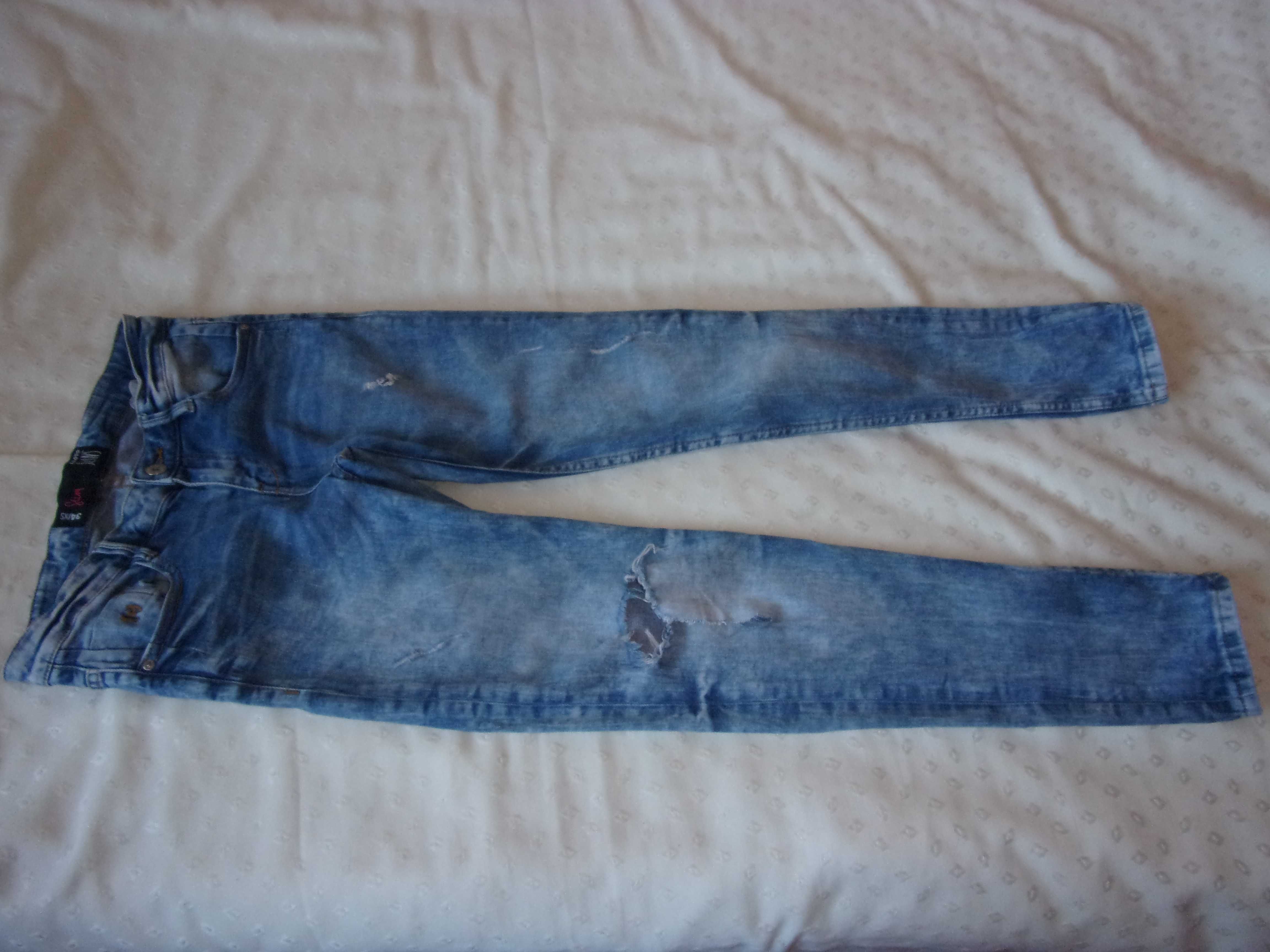 jeansy damskie dziewczece CROPP 34 / XS - slim - z dziurami