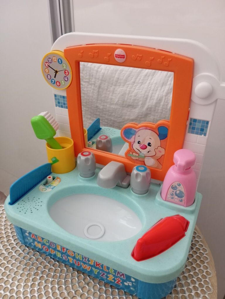 Umywalka szczeniaczka Fisher Price łazienka zabawka interaktywna