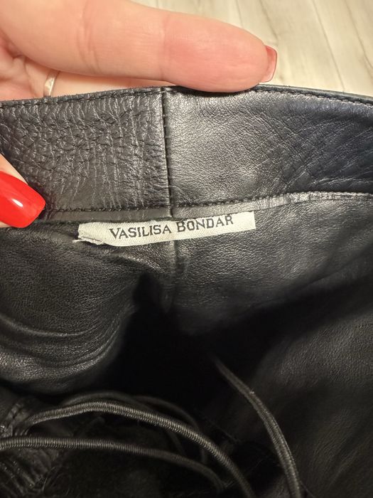 Шкіряні ботфорти за коліно