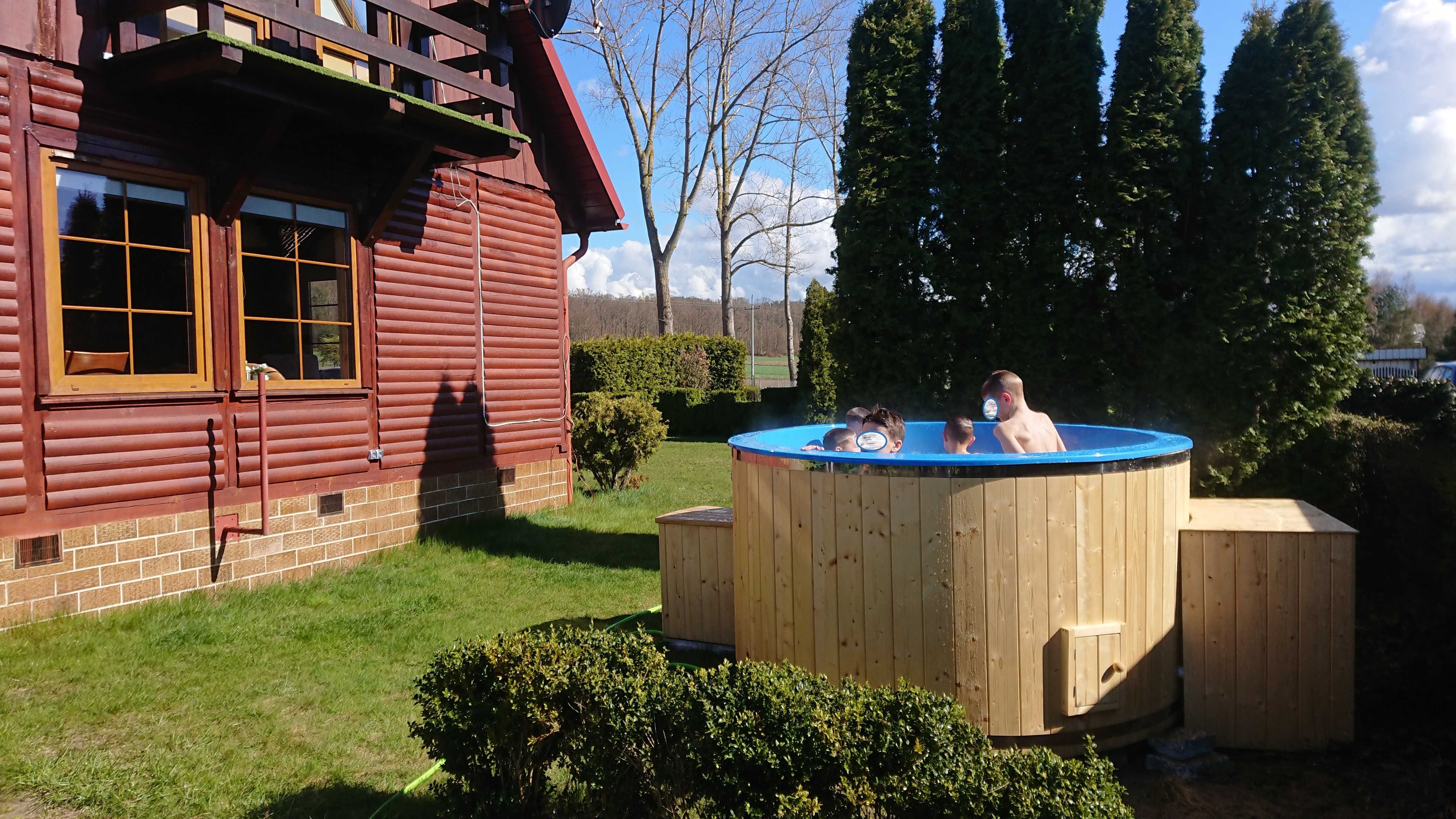 Dom nad jeziorem z dużą działką i balią z jacuzzi