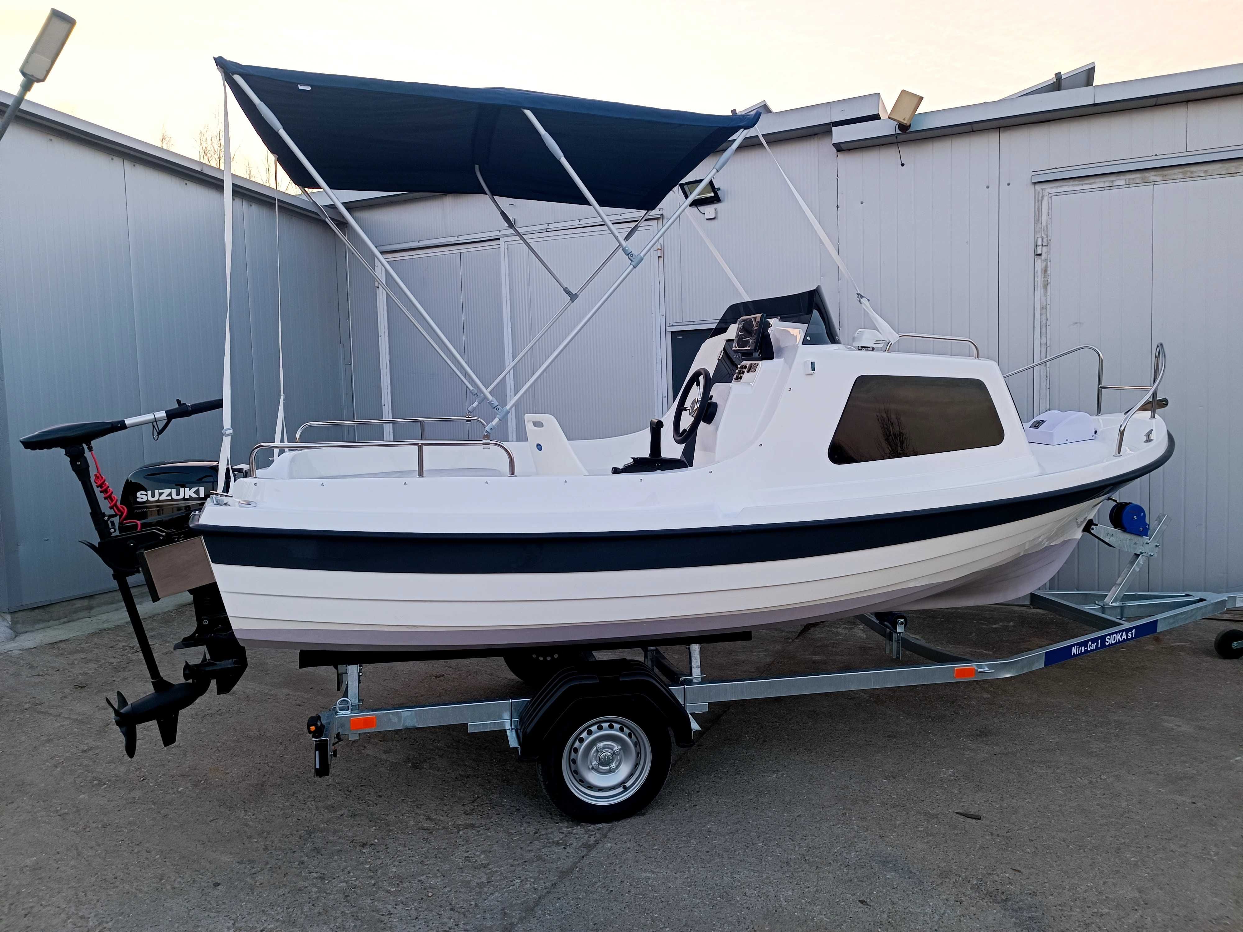 Łódź kabinowa wędkarska kormoran 490 w pełni wyposażony  Suzuki 20 km