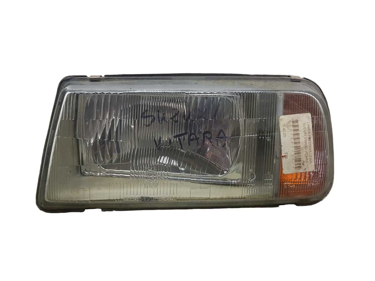 Suzuki Grand Vitara Lampa Reflektor Lewa Przednia Lewy Przód LP