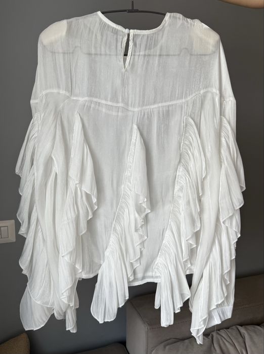 Нарядна напівпрозора блуза вільного крою