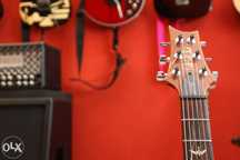 Aulas de guitarra presenciais ou online