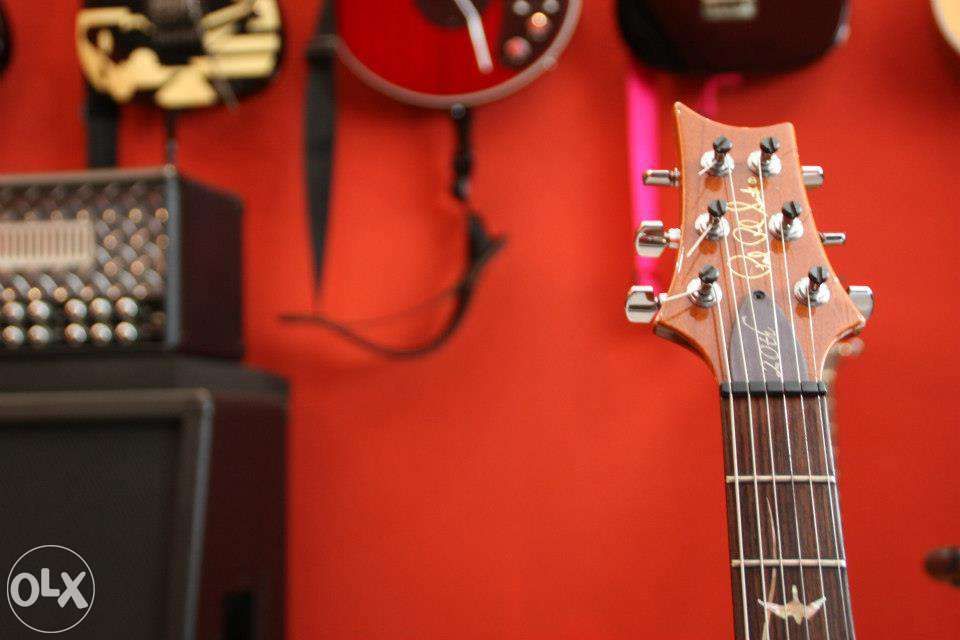 Aulas de guitarra presenciais ou online