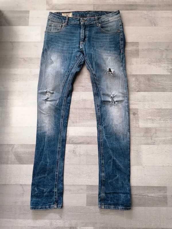 Dżinsy spodnie męskie dżinsowe chłopięce Zara Man rurki z dziurami M