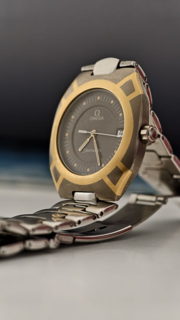 Omega
Polaris Titane 120m e Ouro 18K; Ano 1982