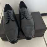 Sapatos de pele de homem