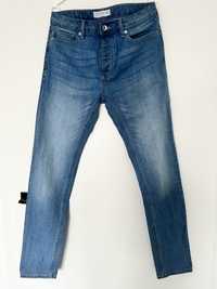 Spodnie jeansowe w rozmiarze 34/32