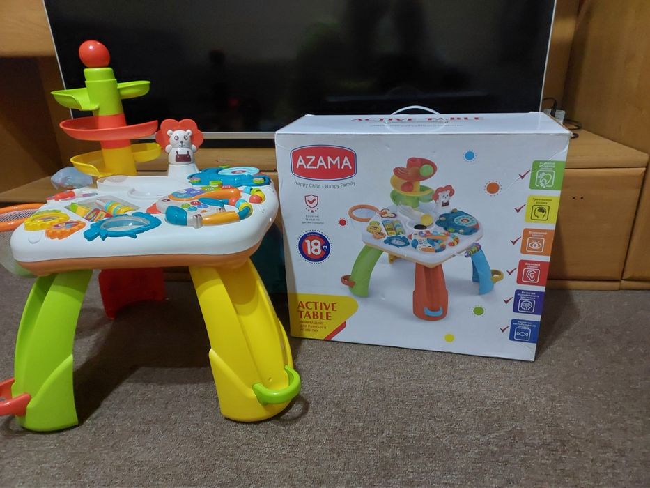 Превосходная развивающая игрушка- столик