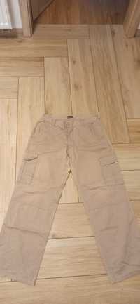 Męskie beżowe spodnie z kieszeniami rozmiar 44